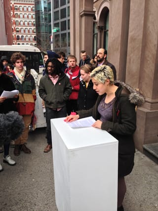 Victoria Sobel, a senior in Cooper Union's School of Art, addressing the audience prior to the start of the rally