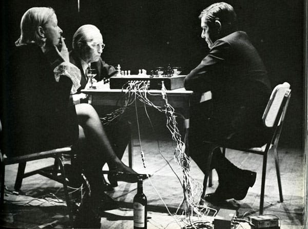 Marcel Duchamp playing chess with John Cage (Image via parsons.edu)