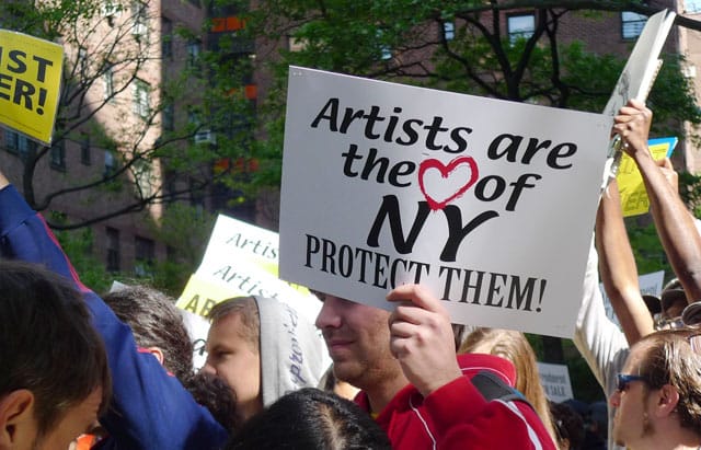 A scene from a 2010 protest in New York City. (photo by Karin Maraney, via agoraartgalleryblog.com)
