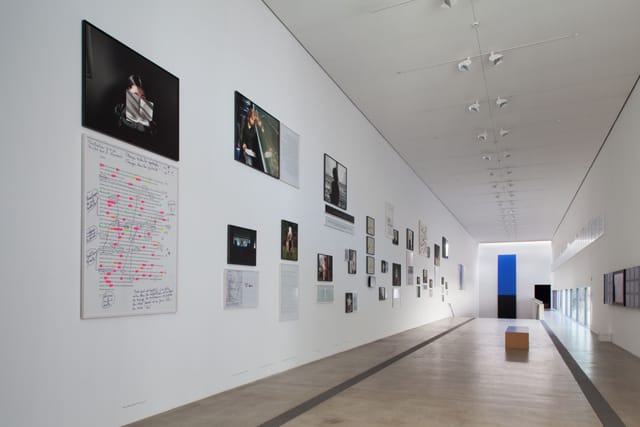 Sophie Calle, "Take Care of Yourself" (2007), photographic prints, texts, frames, video screens (courtesy the artist and Paula Cooper Gallery; © 2012 Artists Rights Society [ARS], New York / ADAGP, Paris; photograph by Sam Fentress)