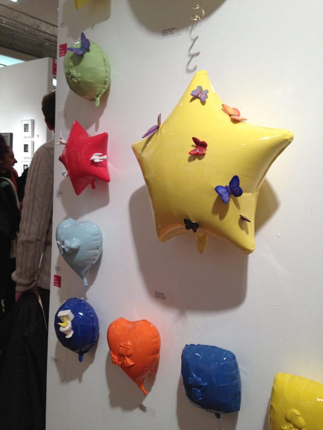 Nina Jun's glazed ceramic balloons. The star is "Silence II," 16.5 square in.
