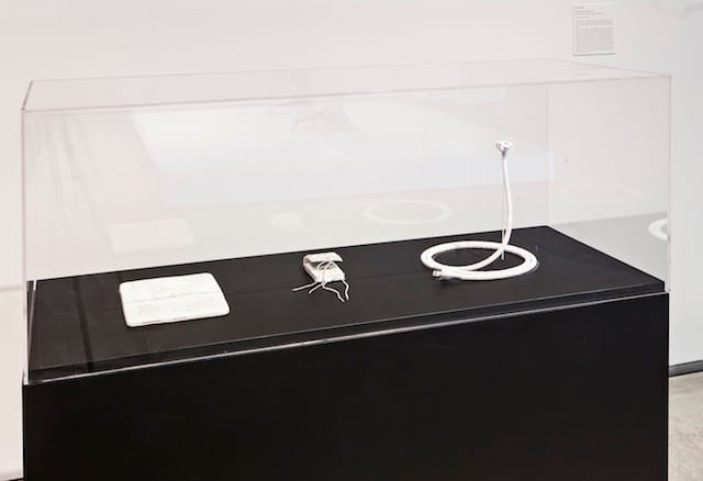 KC Adams, Cyborg Hybrid Accessories series: iPad is iCree Floral, 2011. Beaded iPad holder. iPad Holder, 2006. Beaded iPod holder. Power Peyote Stitch, 2011. Beaded MacBook Pro electrical cord. Courtesy the artist and The Power Plant. Photo by Toni Hafkenscheid.