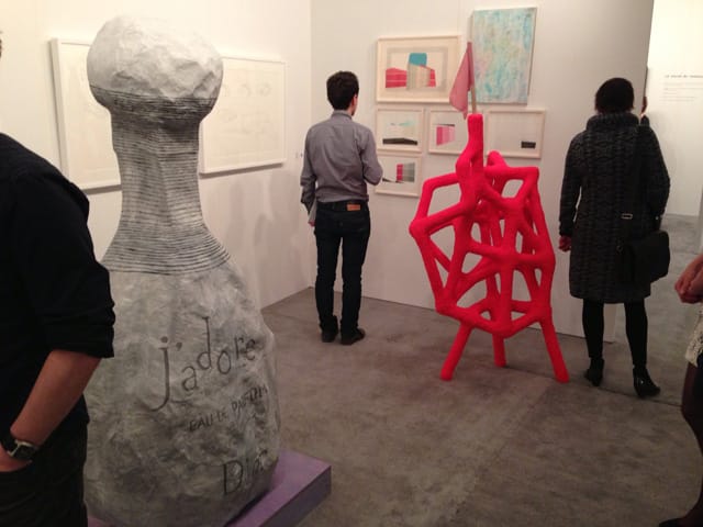 A view of the Parisian Laundry booht, with Papier-mâché sculptures by Cynthia Girard and Jaime Angelopoulos dominating things.