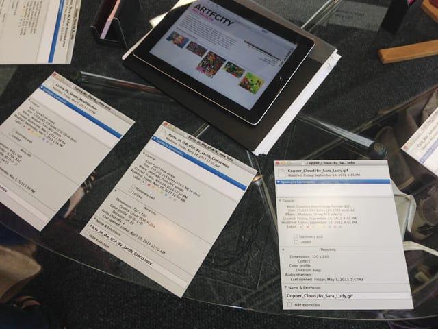 The labels for each of the 11 works are presented in a very computer aesthetic. And a specially designed AFC site — which is not public yet — shows potential collectors more information about each artist. (photo by the author for Hyperallergic)