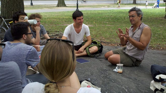 Andy Bichlbaum of the Yes Men leading a discussion with our New York Arts Practicum class in Central Park (all photos by the author for Hyperallergic)