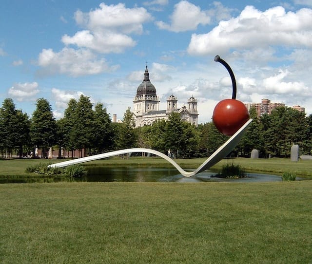 Claes Oldenburg, "Spoonbridge and Cherry." Minneapolis Sculpture Garden, Walker Art Center, Minneapolis Stainless steel and aluminum painted with polyurethane enamel 29 ft. 6 in. x 51 ft. 6 in. x 13 ft. 6 in. (9 x 15.7 x 4.1 m) Commissioned February 1985 by the Walker Art Center Gift of Frederick R. Weisman in honor of his parents, William and Mary Weisman Installed May 9, 1988 Inaugurated May 11, 1988