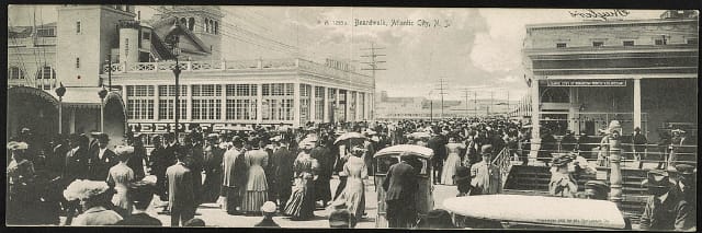 Boardwalk, Atlantic City, N. J. Date Created/Published: c1905. Medium: 1 photomechanical print (postcard) Summary: Postcard shows people on the boardwalk in Atlantic City, New Jersey.