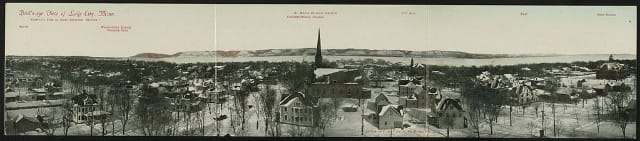 Bird's-eye view of Lake City, Minn. Creator(s): Phillips, F. H., copyright claimant Date Created/Published: c1907. Medium: 1 print (postcard) : color. Summary: Postcard shows residential view of Lake City, landmarks are indicated above buildings. Bluffs in background.