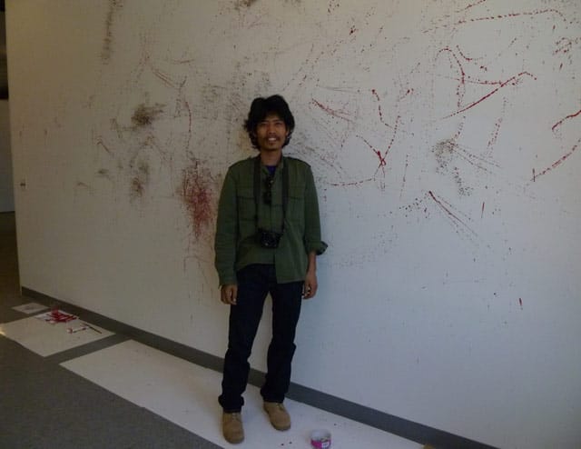 Artist Vandy Rattana in his LMCC studio on Governors Island