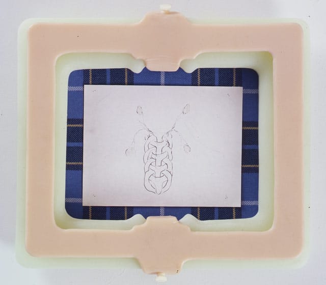 Matthew Barney, “CREMASTER 4: Manx Manual” (1994–95), graphite, lacquer, and petroleum jelly on paper in cast epoxy, prosthetic plastic, and Manx tartan,13 x 15 in (Private collection)