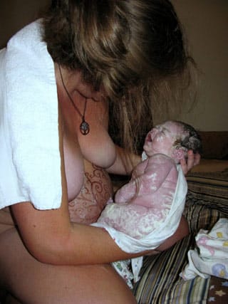 A photo from Emma Kwasnica's unassisted birth of her daughter this past fall. It's part of an album that she has on Google+ but is afraid to post on Facebook for fear of censorship. (click to enlarge) (courtesy Kwasnica)