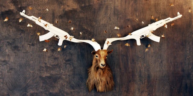 Peter Gronquist, One in a Million, 2013, mixed media with taxidermy and 24 karat gold, 40x30x15 inches