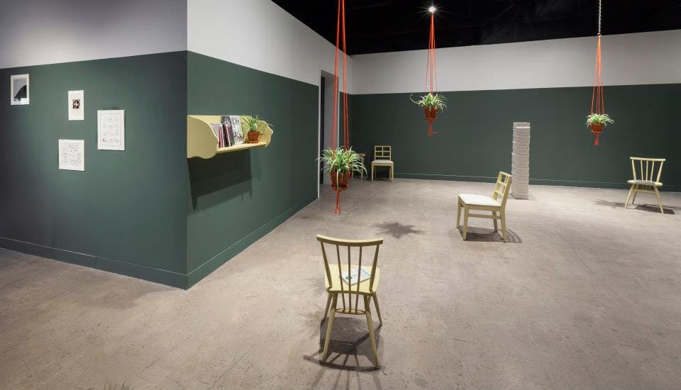 Installation shot of Ulrike Müller's Herstory Inventory: Shoes and Books (2007–2013), at Oakville Galleries, 2013. (Photo: Toni Hafkenscheid, from Oakville Galleries Facebook Page)