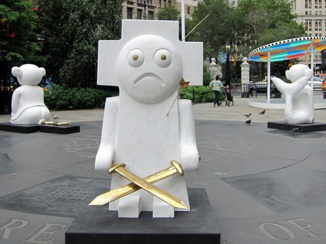 Olaf Breuning, "The Humans" (2007), marble, bronze six characters cycle of human evolution from fish to fisher king looking comically miserable to whole loop around