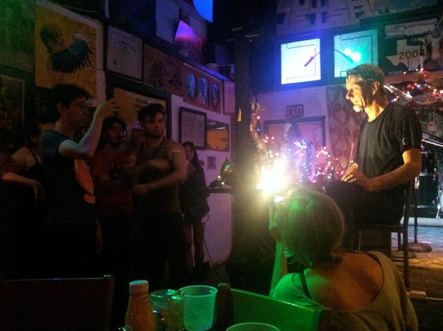 A circle formed around Scott Hawkins