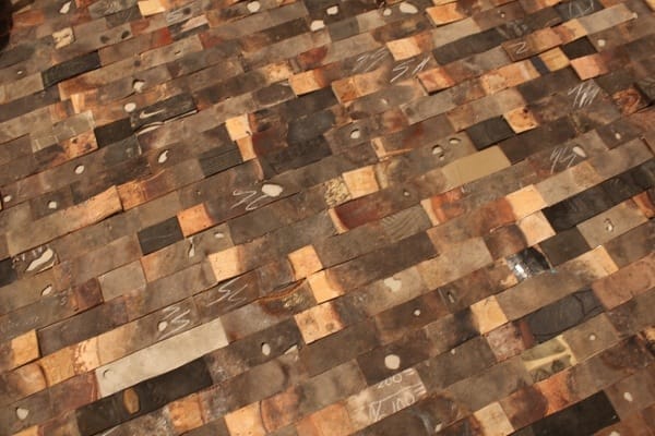 Gabriel de la Mora, from Mexico City, repurposes found objects in abstract ways. Seen here: “The weight of thought,” from 2013, made from discarded leather and plastic shoe soles.