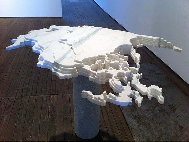 Maya Lin, “Disappearing Bodies of Water: Arctic Ice” (2013), Vermont Danby marble, granite base, 48 x 46 x 52 inches. (© Maya Lin Studio, courtesy Pace Gallery)