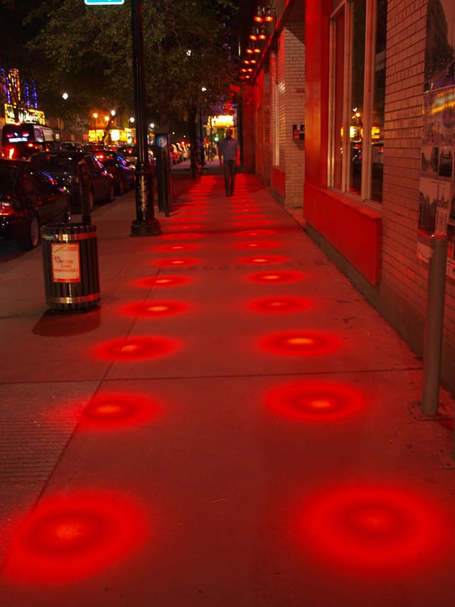 Red Lights in the Quartier des Spactacles in Montreal (photograph by Emmanuel Milou/Flickr user)