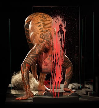Ron Athey performing "Self Obliteration I & II" in 2011 (photo by Miha Fras, via ronatheynews.blogspot.com)