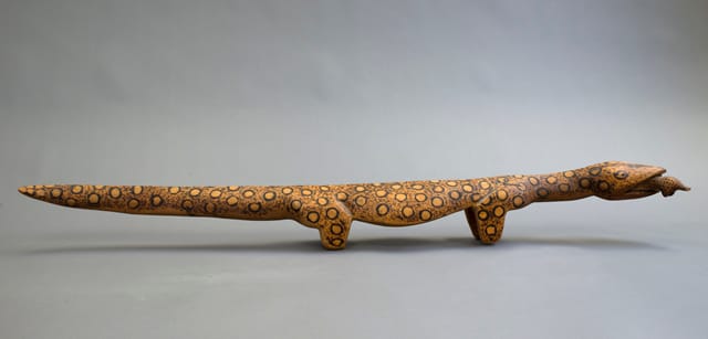 A carving of a goanna from Amata in the Anangu Pitjantjatjara Yankunytjatjara Lands in South Australia. This carving was collected in 1971 by the Uprange Ministerial Expedition and is part of a group of items made by Aboriginal guides and their families during the progress of the field trip.