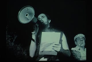 Bruce High Quality Foundation, "L’eau de Vie, un film de Jean-Luc Godard," film still (via duveberlin.com)