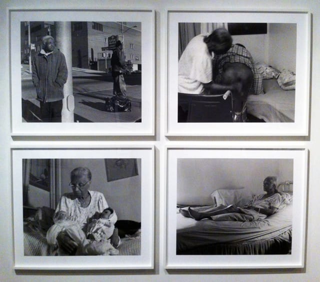 LaToya Ruby Frazier, installation view of four silver gelatin photographs, clockwise from left: "Grandma Ruby and U.P.M.C. Braddock Hospital on Braddock Avenue" (2007); "Grandma Ruby Wiping Gramps" (2003); "Grandma Ruby on Her Bed" (2005); "Grandma Ruby Holding Her Babies" (2002)