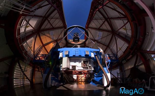The Magellan Telescope with MagAO’s Adaptive Secondary Mirror (ASM) jmounted at the top looking down some 30 feet onto the 21-foot diameter primary mirror, which is encased inside the blue mirror cell. (Photo: Yuri Beletsky, Las Campanas Observatory)