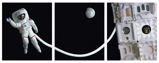 William Wegman, "Chip and Batty Explore Space" (2001), photograph. Here two Weimaraners pose as astronauts, one on a space walk, one in the space station. NASA actually loaned Wegman a spacesuit model for the work. 