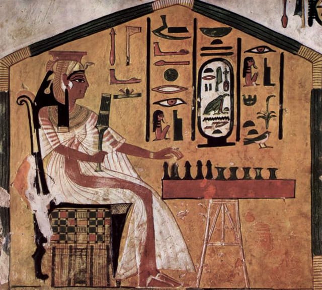 A painting from the tomb of Queen Nefertari shows her playing Senet (via Wikipedia)