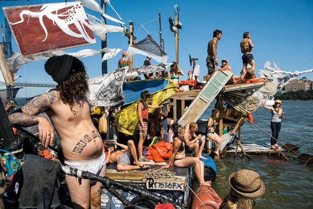 The three rafts of the Swimming Cities “Voltron” together for a swimming party in the Hudson River near the George Washington Bridge, 2008