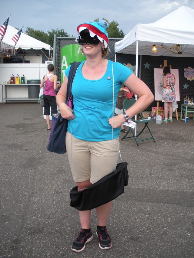 This woman is dressed like the cat in the shark costume in the Roomba cat video.