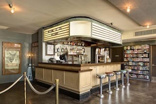 Nighthawk Cineam lobby and bar (Image via Caliper Studio)