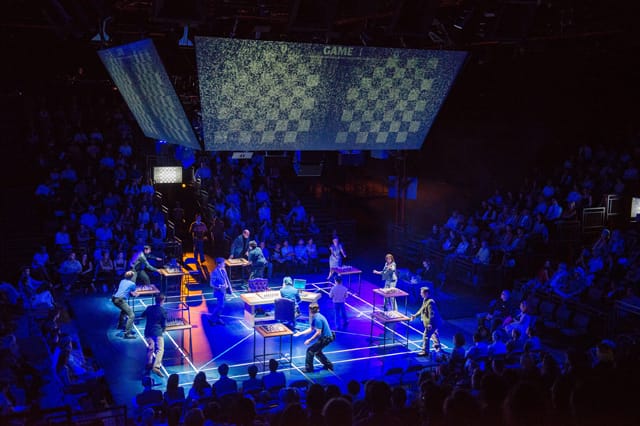 Photos of "The Machine"  Written by Matt Charman and Directed by Josie Rourke about Gary Kasparov's 1997 chess match against IBM Big Blue, on September 5, 2013 during a performance with audience. the performers: Garry Kasparov -Hadley Fraser Clara Kasparov -Francesca Annis Feng-Hsiung Hsu- Kenneth Lee Mandy Dinkleman -Phil Nichol Murray Campbell- Trevor White Joel Benjamin -Brian Sills Mikhail Botvinnik/Dr. Hans Berliner/Owen Williams -John Ramm Photographer/Anatoly Karpov/IBM Vice-President 2/Cornelius Booth Tamsin/Karen Daley Myers Antonia Bernath Katya/Angela Burgess- Lucille Sharp IBM Vice-President 1/Ad Director David Mumeni Young Garry/Josh Lorenzo Allchurch/Nicholas Croucher AV Performer/Technician Daniel Harries Camera Operator/Performer Rob Lines Credit:  Stephanie Berger.  All Rights Reserved. Photo Credit:  Stephanie Berger.