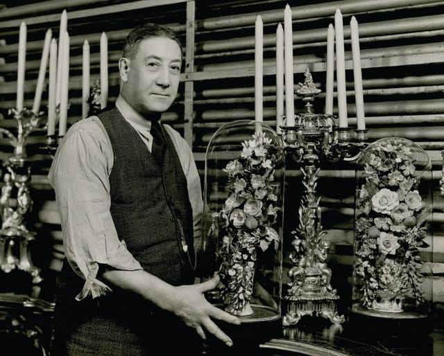 Prop master for Victoria Regina. The candelabra and wax flowers are in the scenery below. Credit: The New York Public Library for the Performing Arts, Vandamm Theatrical Photograph Collection, Billy Rose Theatre Division