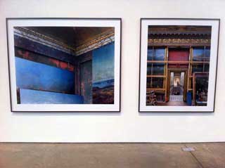 Installation view: Robert Polidori, "Salle de Crimée Sud. Versailles” (2007/2013), C-print, 60 x 72 in, and “Salle des Constantine. Salles de l’Afrique. Versailles” (1985/2013), C-print, 60 x 50 in (click to enlarge)