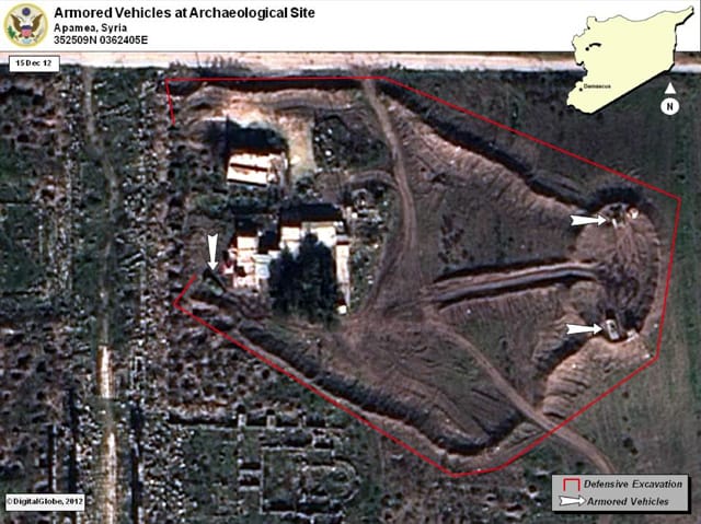 Ground was excavated as a defensive measure around the armored vehicles.