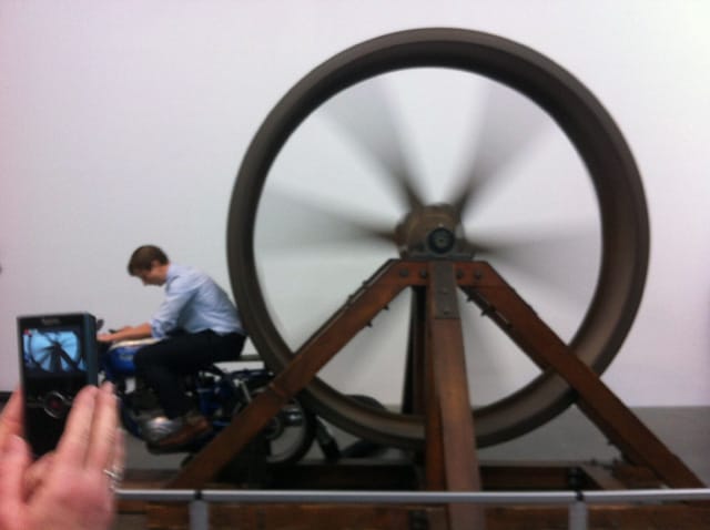 Chris Burden, "The Big Wheel" (1979). Three-ton, eight-foot diameter, cast-iron flywheel powered by a 1968 Benelli 250cc motorcycle, 112 × 175 × 143 inches. The Museum of Contemporary Art, Los Angeles. Gift of Lannan Foundation.