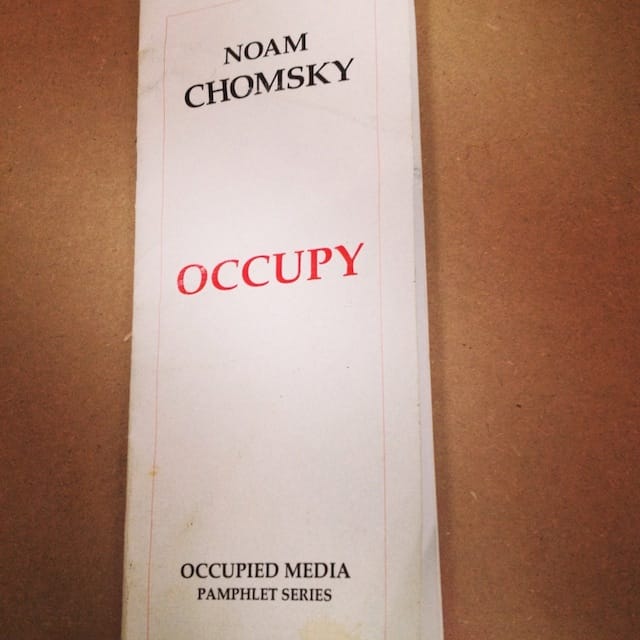 Chomsky OCCUPY pamphlet from Mattthias Neumann's The People's Library at the Public Museum (2011-2013). Photograph by the author for Hyperallergic.