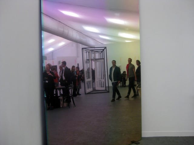 frieze doors reflected in a mirror