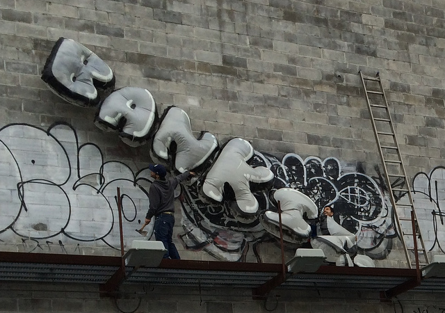 The Banksy coming down.