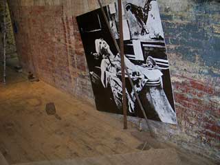 Allen Brewer and Pamela Valfer, "Ad infinitum" (detail) (2013), graphite on venetian plaster, wood, carpet flooring, dimensions variable (click to enlarge)