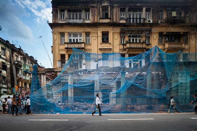 Country: Myanmar Site: Yangon Historical City Center Caption: Maha Bandoola Street. In our days, the destruction of historical testimonies of the past is a sad reality in Yangon. The lack of awareness about historical buildings further prompts the use of modern construction. Outreach activities among the local population are urgently needed before it is too late. Image Date: December 2011 Photographer: Christopher Davy/World Monuments Fund Provenance: 2014 Watch Nomination Original: from Sharefile