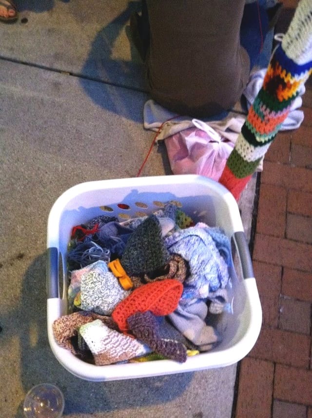 A collection of donated yarns for the Division Street Yarn Bomb project. 