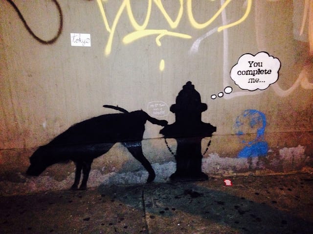 Banksy hits that sweet spot of recognition + a little something extra. Here, it's a joke about co-dependancy. Get it?