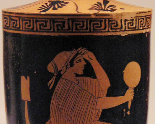 Seated woman holding a mirror (c. 470-460 BCE) National Archaeological Museum in Athens (image via Wikipedia)