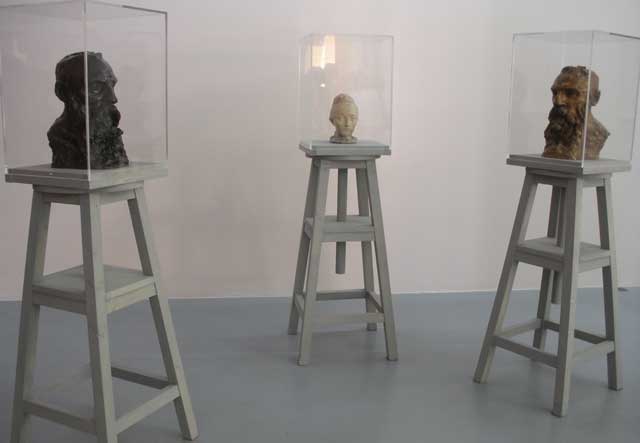 Two busts of Rodin by Camille Claudel, and between them, a bust of Claudel by Rodin, at the Collection Lambert (all photos by the author for Hyperallergic)
