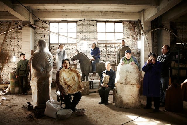 Prune Nourry and the craftsman team from the Li Yuan Terracotta Factory for Terracotta Daughters, Xi'an, China, November 2012, photograph by Zachary Bako&nbsp;