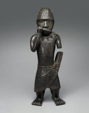 Edo. Figure of a Hornblower, ca. 1500-1550. Copper alloy, 24 1/2 x 8 1/2 x 6 in. (62.2 x 21.6 x 15.2 cm). Brooklyn Museum, Gift of Mr. and Mrs. Alastair B. Martin, the Guennol Collection, 55.87. Creative Commons-BY Image: front, 55.87_front_SL1.jpg. Brooklyn Museum photograph