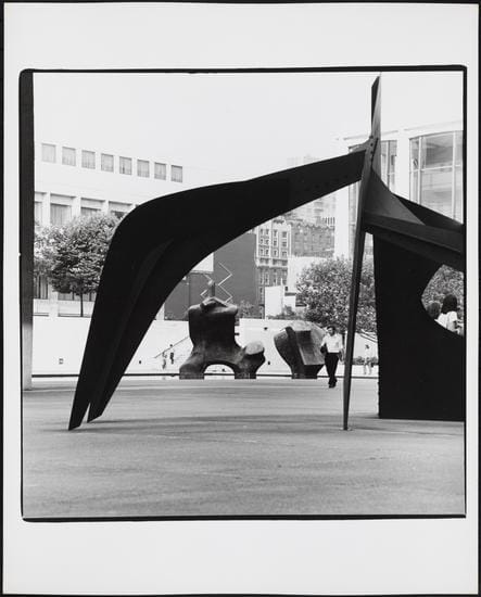 Edmund V. Gillon, ["Le Guichet" ("The Box Office") stabile, "Reclining Figure" in the background.] (c. 1976), gelatin silver print, 10 x 8 in