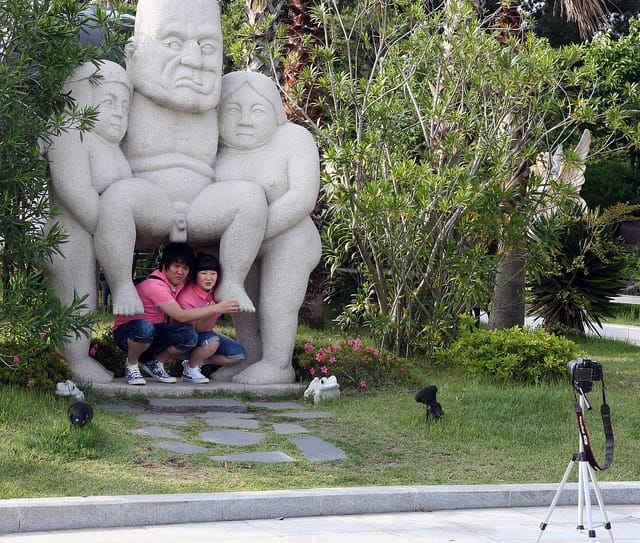Posing outside Jeju's Museum of Health and Sex (photo by Ben Kucinski, via Flickr)